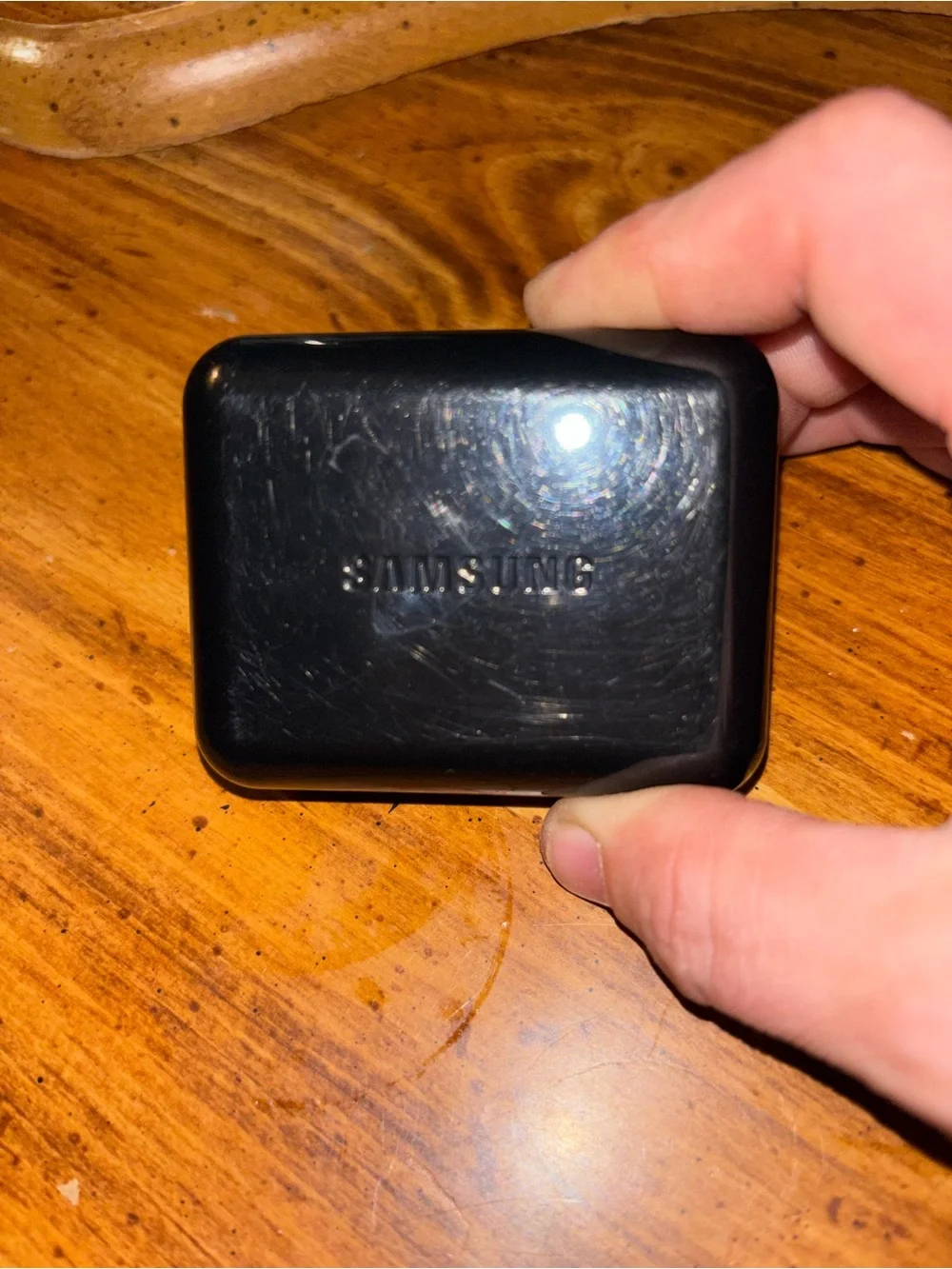 Samsung earbuds, wired, with microphone and vol. control. Cool carrying case!